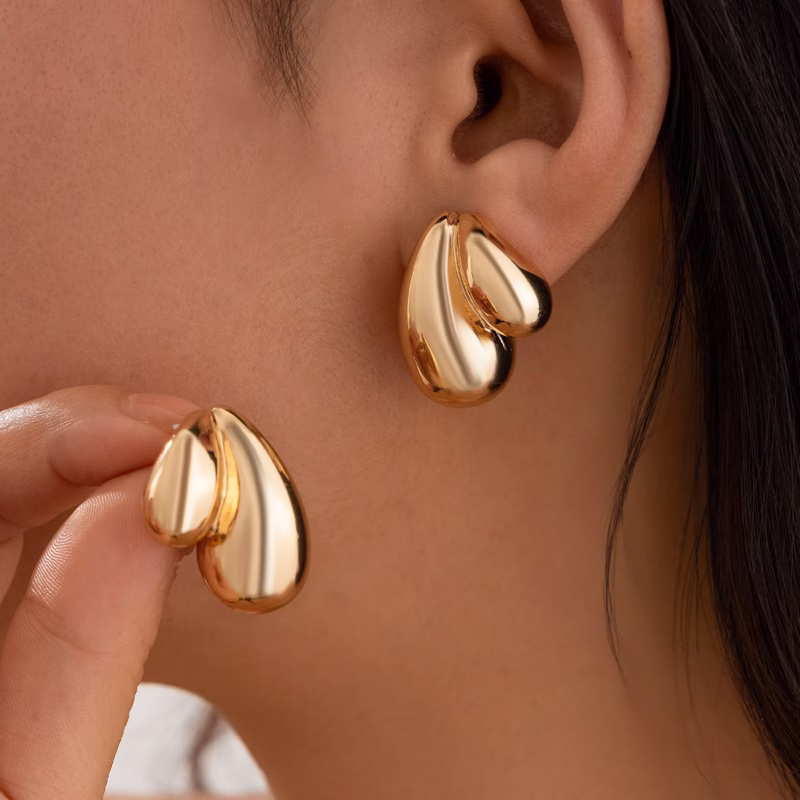 European and American cross-border design light-sensitive comma water drop earrings women fashion ins geometric metal earrings earrings
